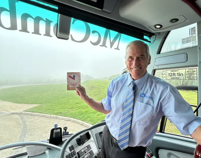 Bus driver in a McComb's coach